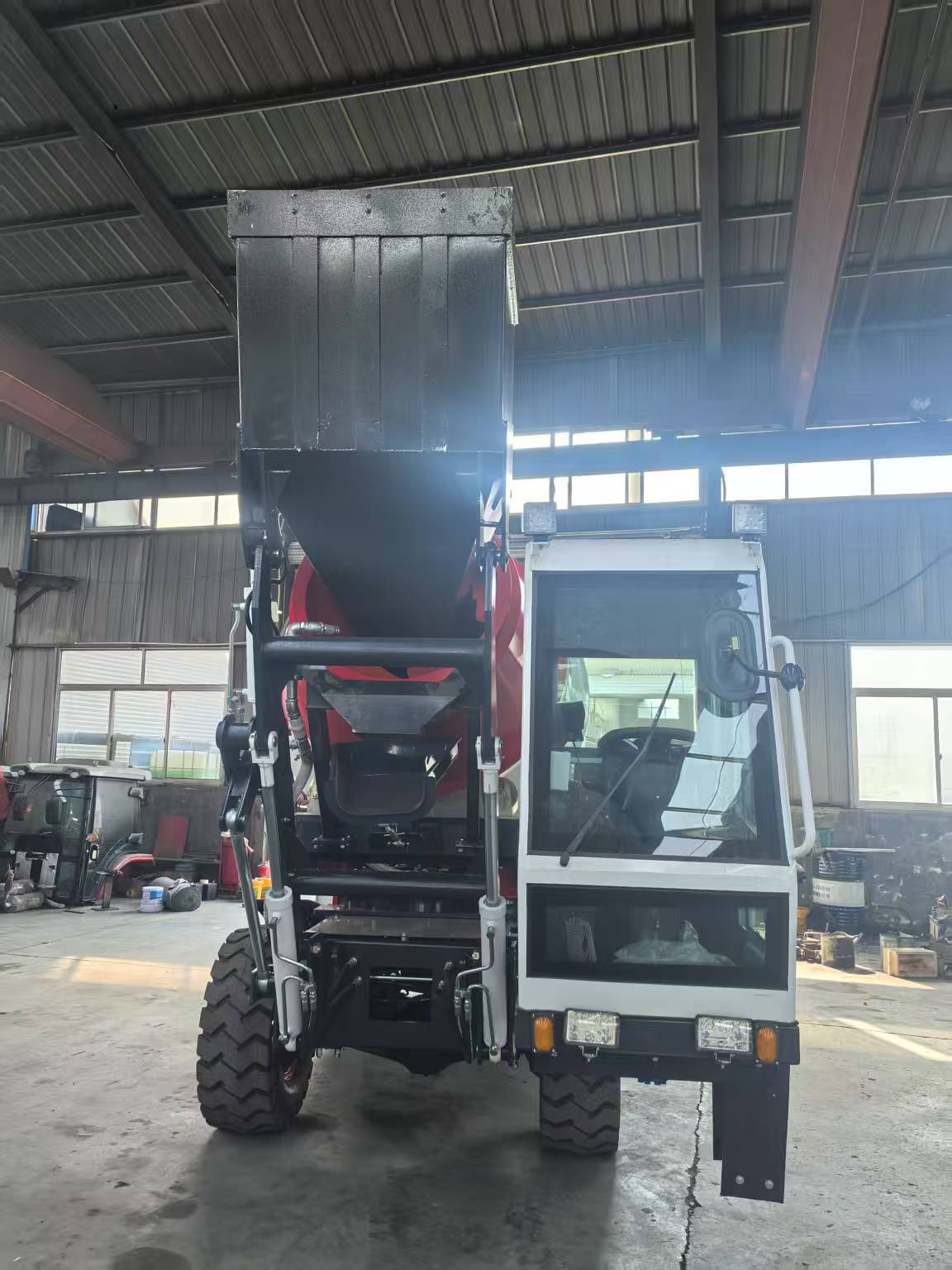 Self-loading concrete mixer equipment